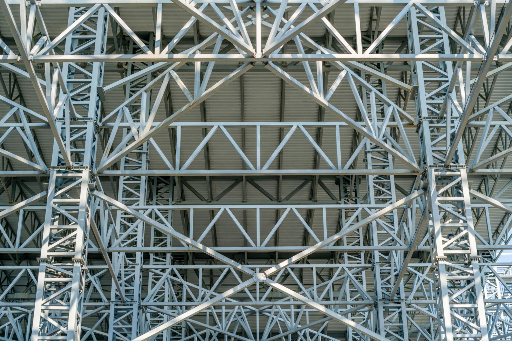 Completed industrial shed structure showcasing steel columns, trusses, and roofing system